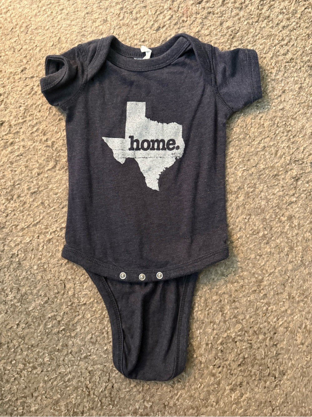 Navy Baby Onesie with Texas "home." Graphic